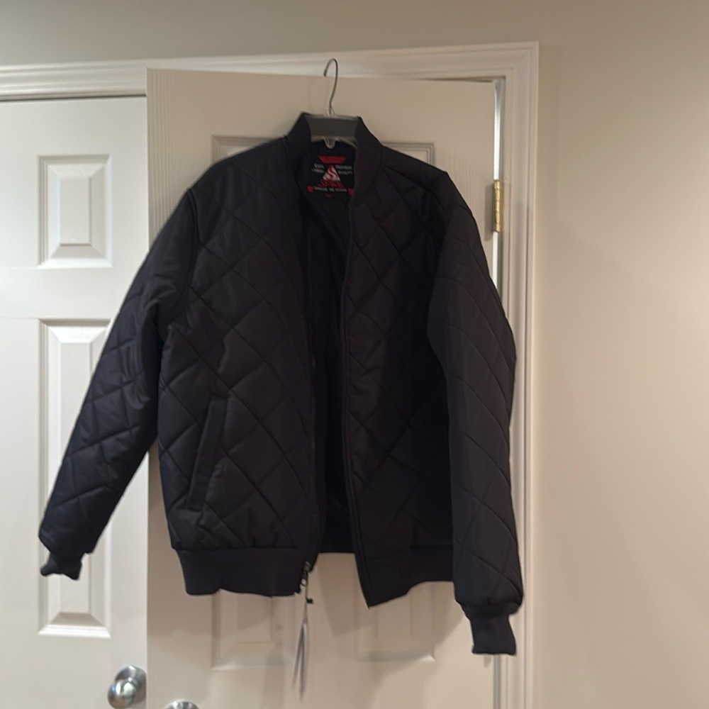 Men’s black jacket never worn